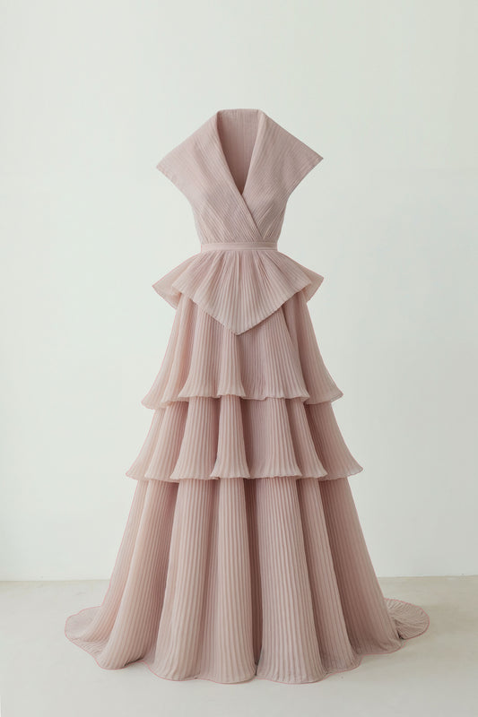 Blush-pink silk chiffon couture gown with a wrapped bodice and tiered pleated skirt by Bilal Barrage