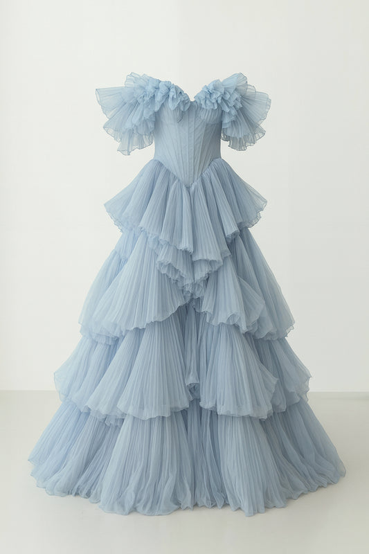 Frost-blue silk chiffon couture gown with an off-shoulder ruffled neckline and corseted bodice by Bilal Barrage