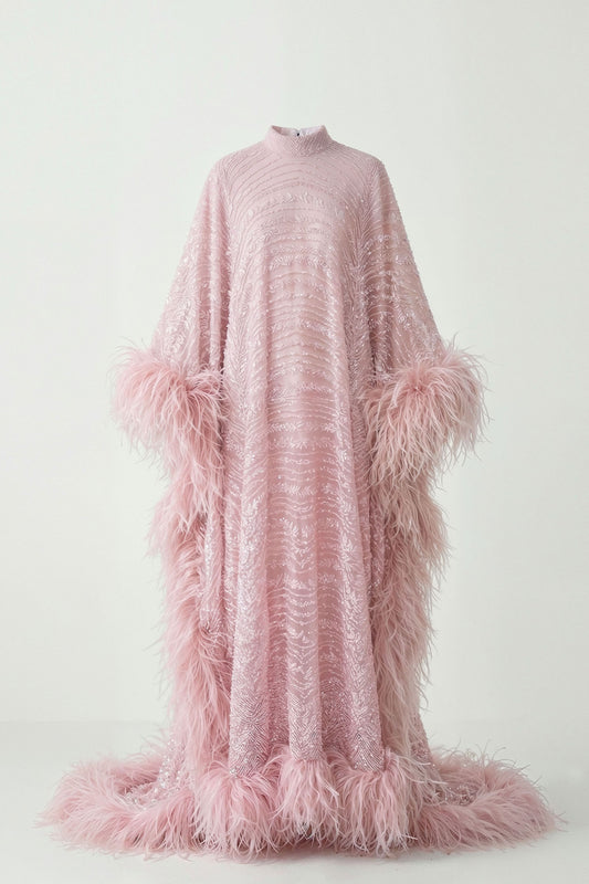 Dusty-pink embroidered tulle couture gown with wide sleeves and ostrich-feather accents by Bilal Barrage